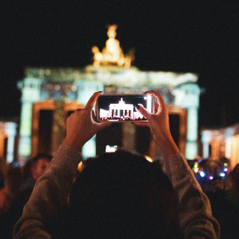 Person photographing with a cell phone